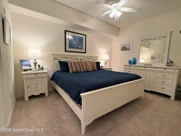 a view of a living room and floor to ceiling window or wooden floor