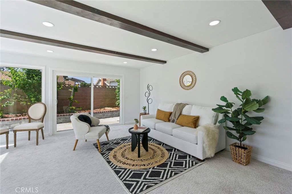 6212 Santa Rita Avenue Garden Grove, CA 92845 - Photo 17 of 50 a living room with furniture potted plant and a large window