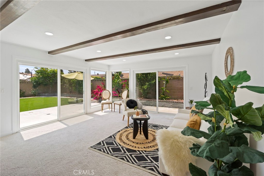 6212 Santa Rita Avenue Garden Grove, CA 92845 - Photo 20 of 50 a living room with furniture and garden view
