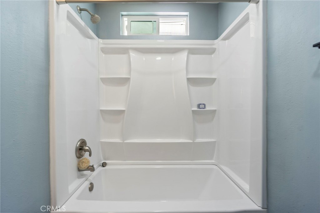 6212 Santa Rita Avenue Garden Grove, CA 92845 - Photo 22 of 50 a bathroom with a bathtub