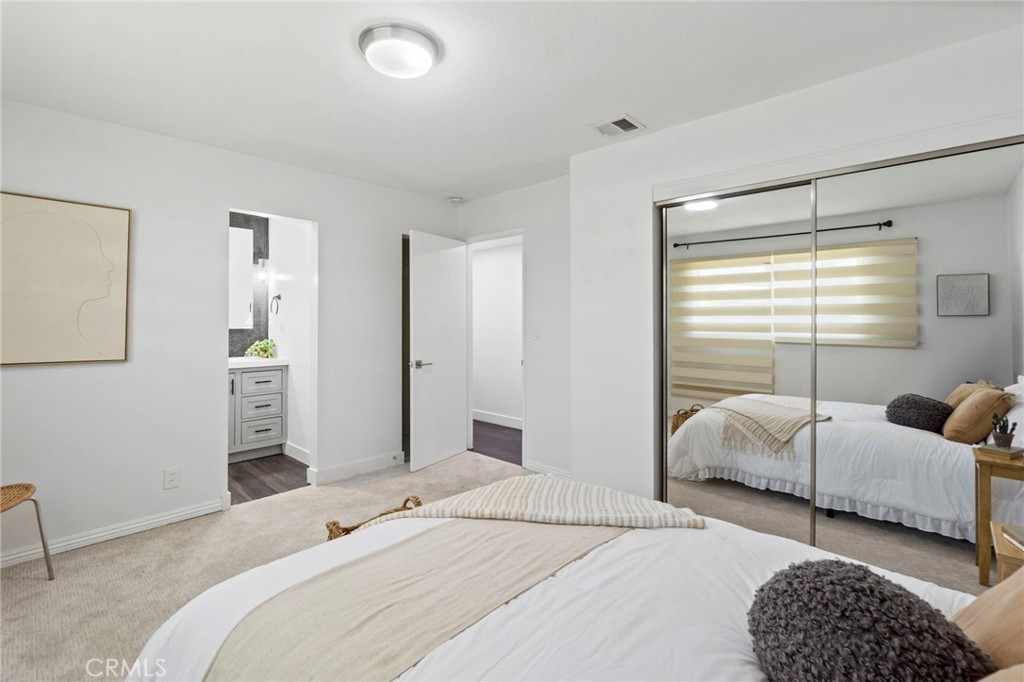 6212 Santa Rita Avenue Garden Grove, CA 92845 - Photo 33 of 50 a bedroom with a bed and a window