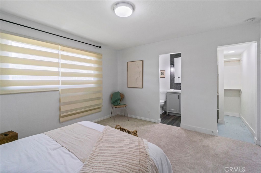 6212 Santa Rita Avenue Garden Grove, CA 92845 - Photo 37 of 50 a bedroom with a bed and a window