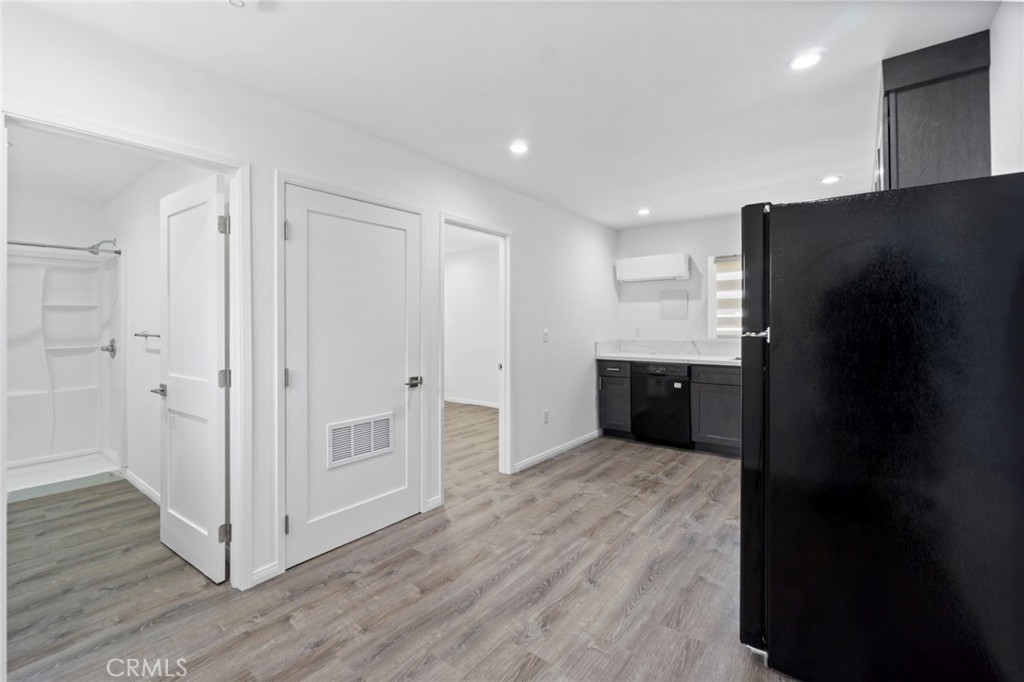 6212 Santa Rita Avenue Garden Grove, CA 92845 - Photo 39 of 50 a view of wooden floor and windows in a room