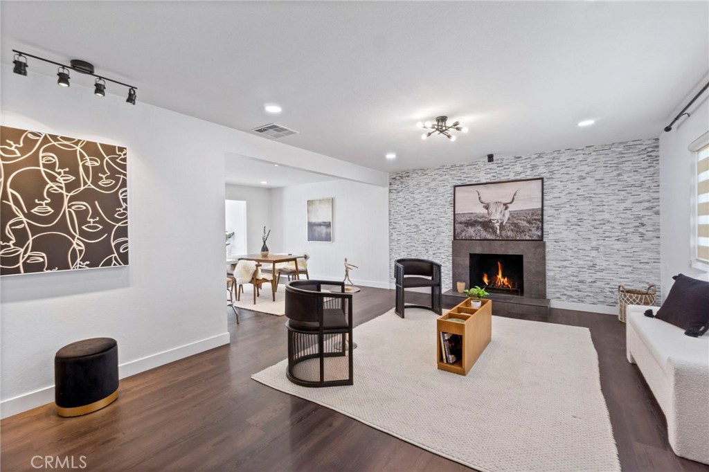6212 Santa Rita Avenue Garden Grove, CA 92845 - Photo 5 of 50 a living room with furniture and a fireplace