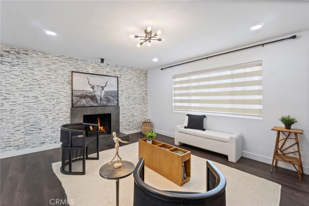6212 Santa Rita Avenue Garden Grove, CA 92845 - Photo 7 of 50 a living room with furniture and a fireplace