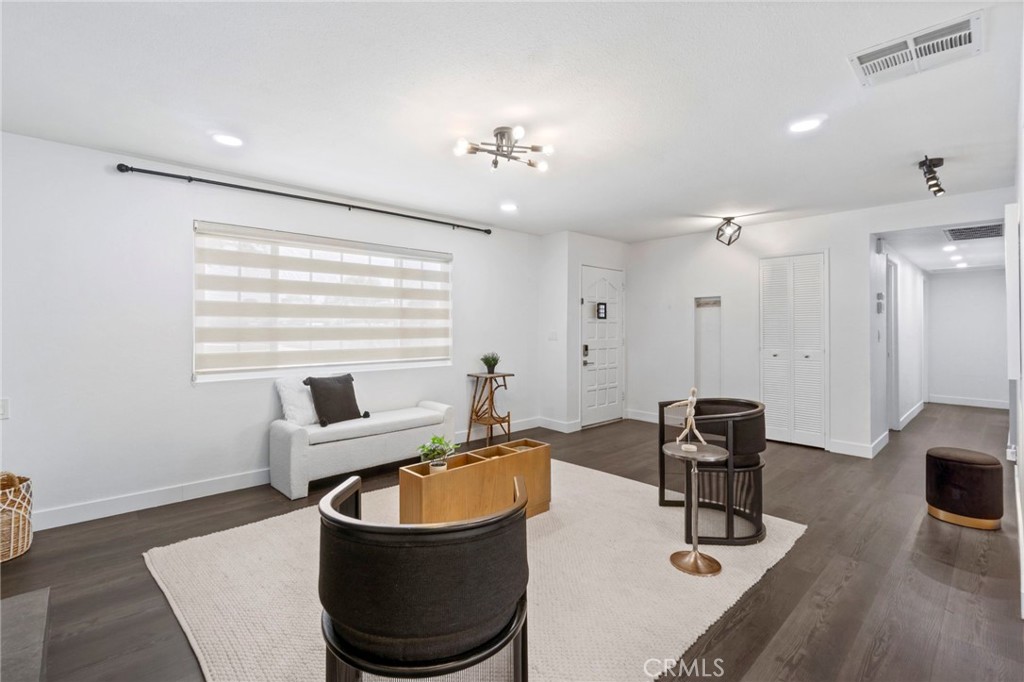 6212 Santa Rita Avenue Garden Grove, CA 92845 - Photo 9 of 50 a kitchen with a table and chairs
