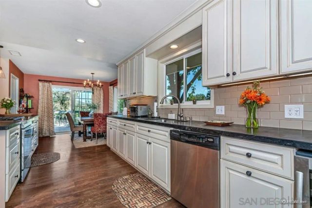 a kitchen with granite countertop lots of counter top space