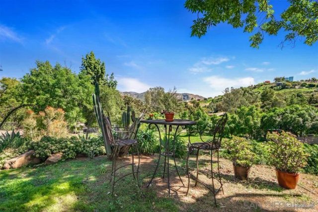 a view of a lake with a garden