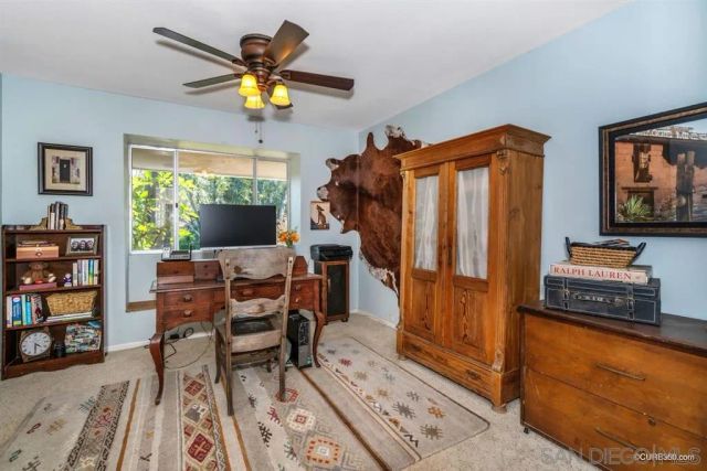 a view of a livingroom with furniture