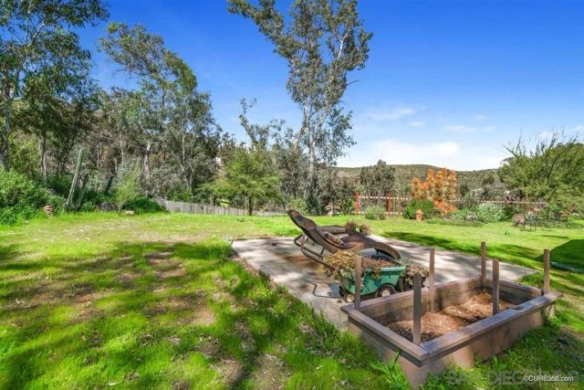 a view of a garden with an outdoor space