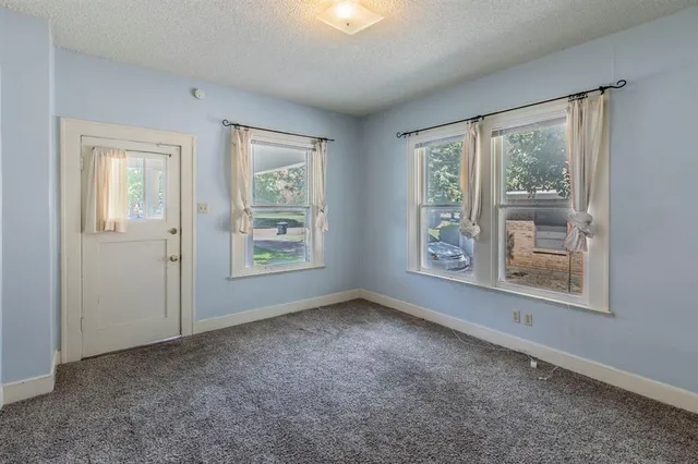 a view of an empty room with window