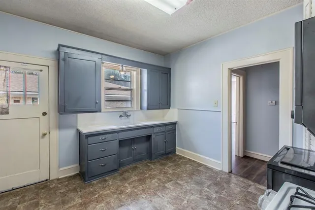 a room with a dresser and a mirror