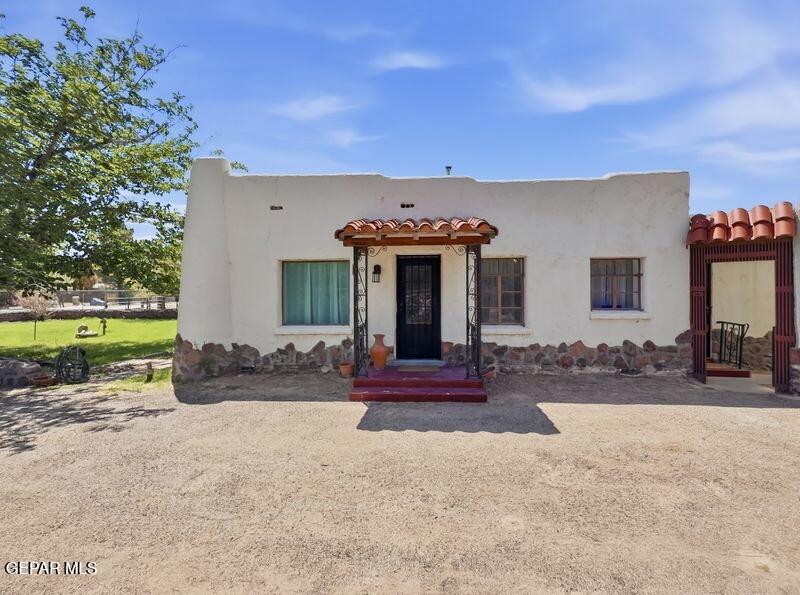 4135 Emory Road El Paso, TX 79922 - Photo 2 of 73 front view of a house with a patio
