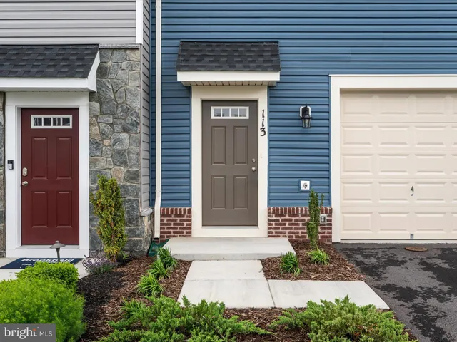 a front view of a house with a door