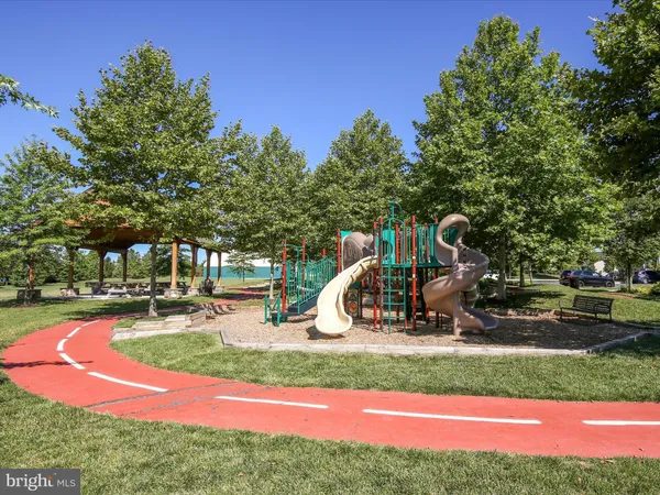 a view of park with swings