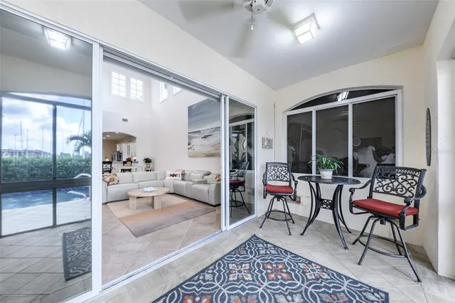 a kitchen with kitchen island granite countertop a sink and cabinets