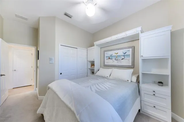 a bathroom with a double vanity sink mirror and shower