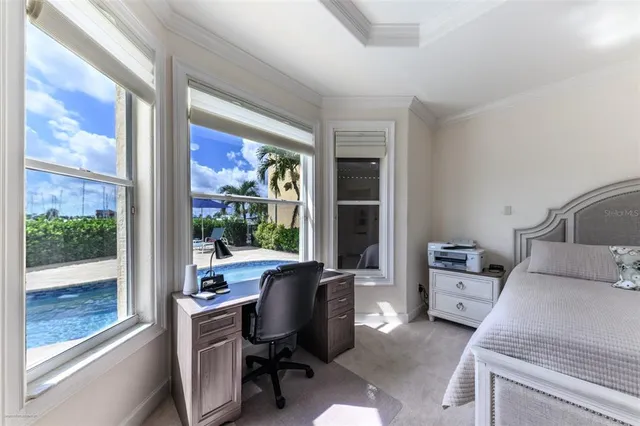 a en suite bathroom with a sink a large mirror and a shower