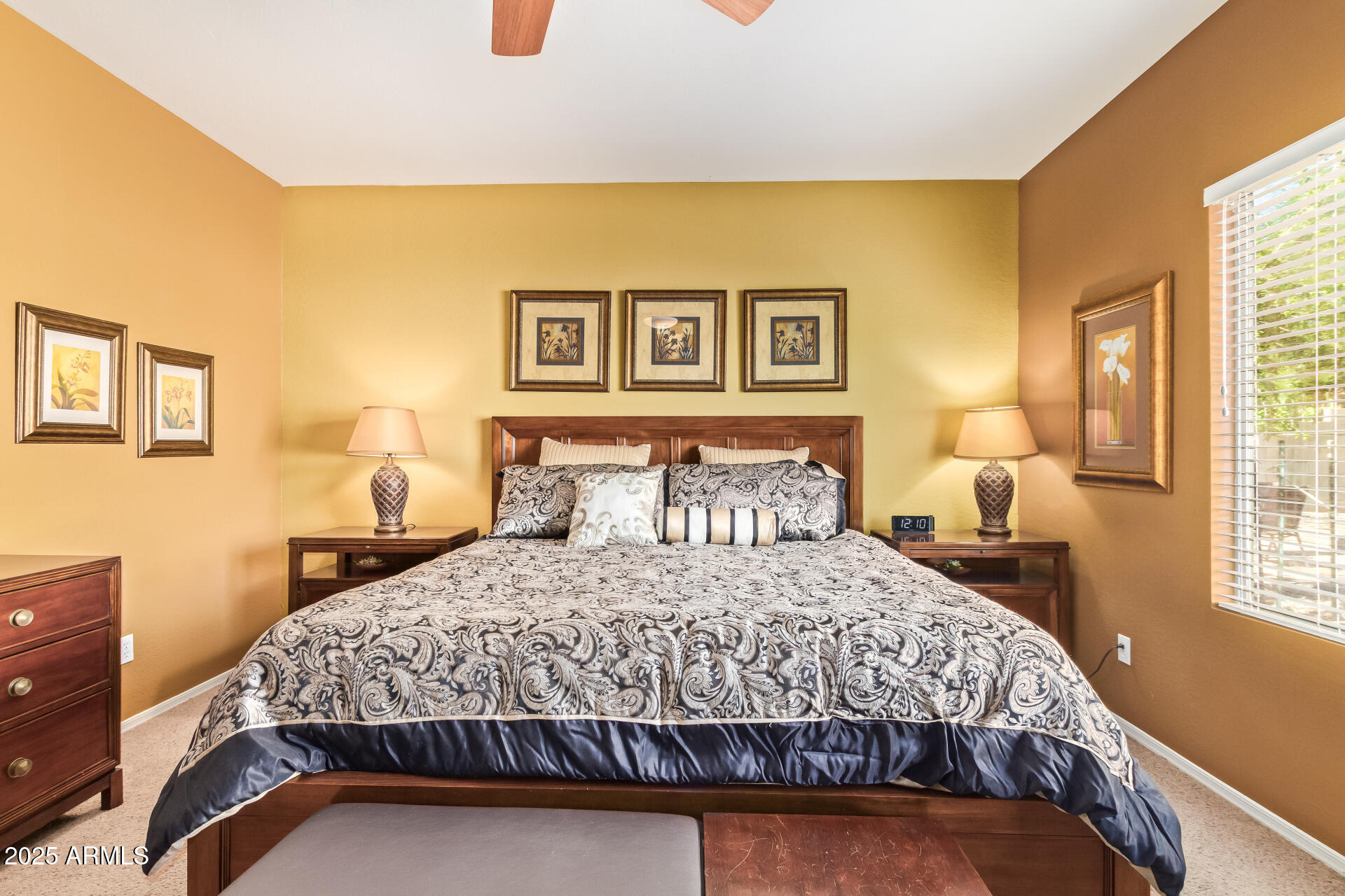 6934 West Beverly Road Laveen, AZ 85339 - Photo 16 of 31 a bedroom with a bed and wooden floor