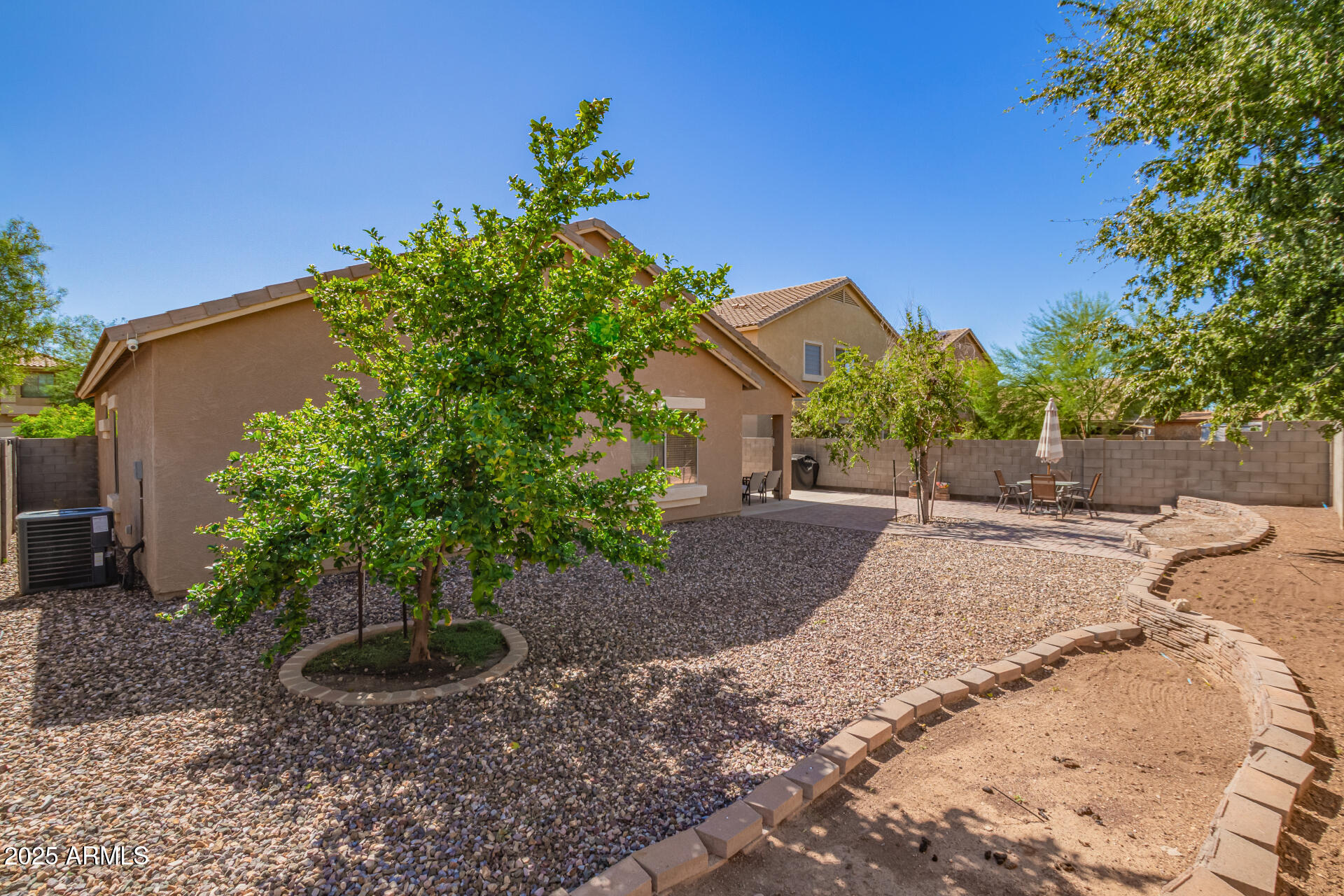6934 West Beverly Road Laveen, AZ 85339 - Photo 29 of 31 a view of a garden with plants