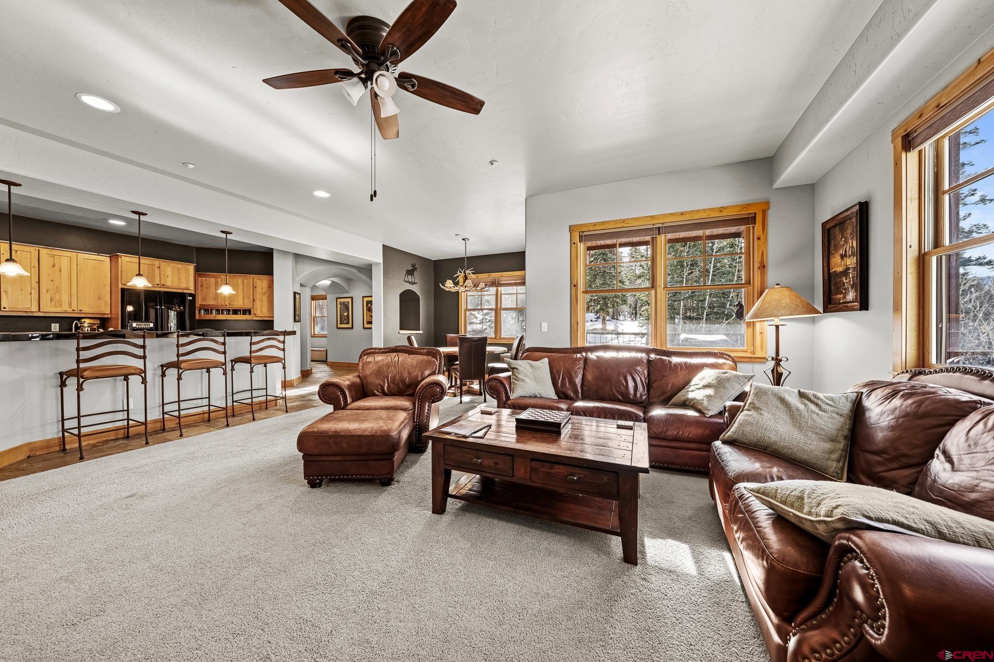 114 Limestone Court Durango, CO 81301 - Photo 13 of 35 a living room with furniture and a large window