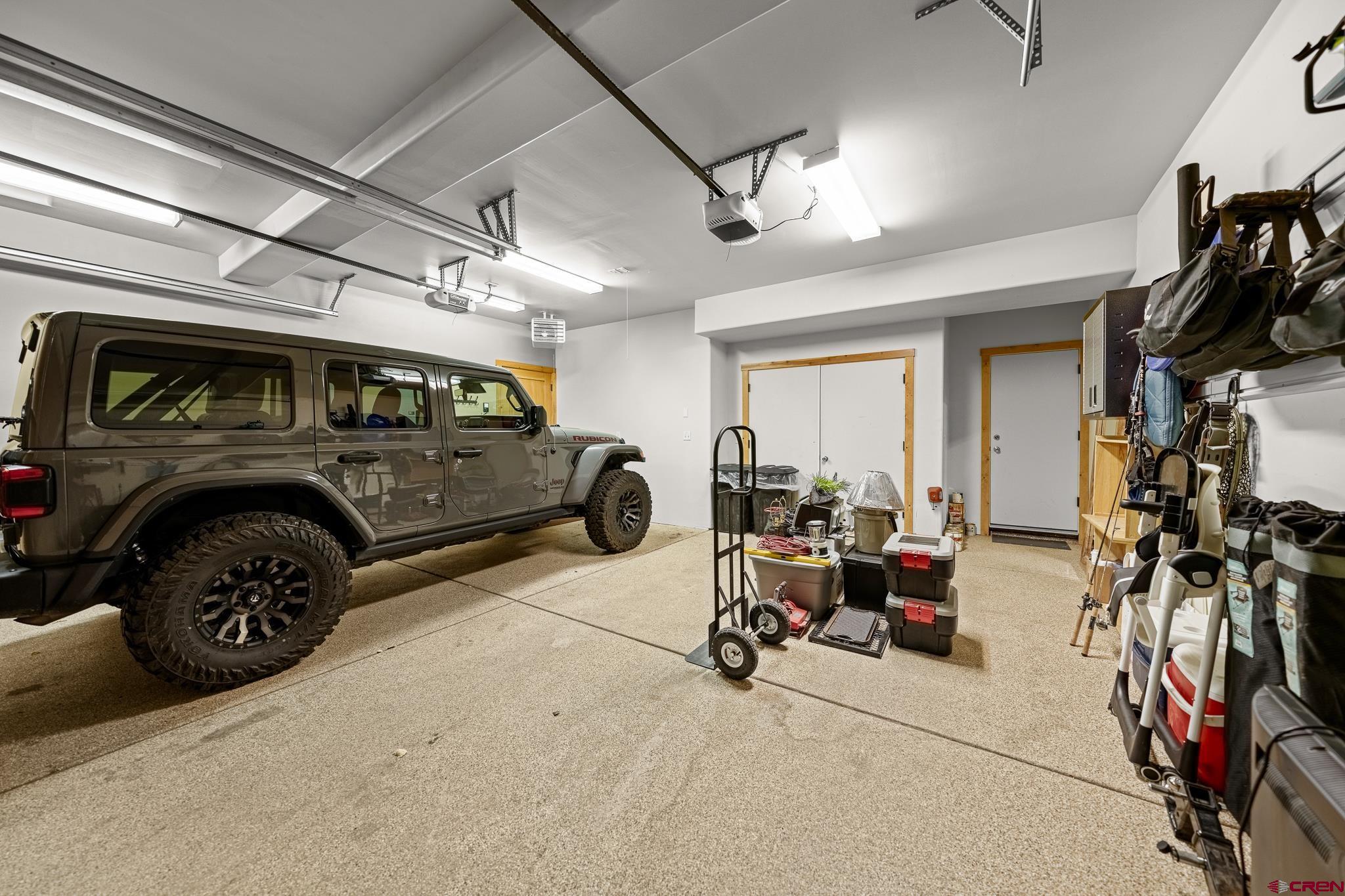 114 Limestone Court Durango, CO 81301 - Photo 29 of 35 a view of a garage with parked cars