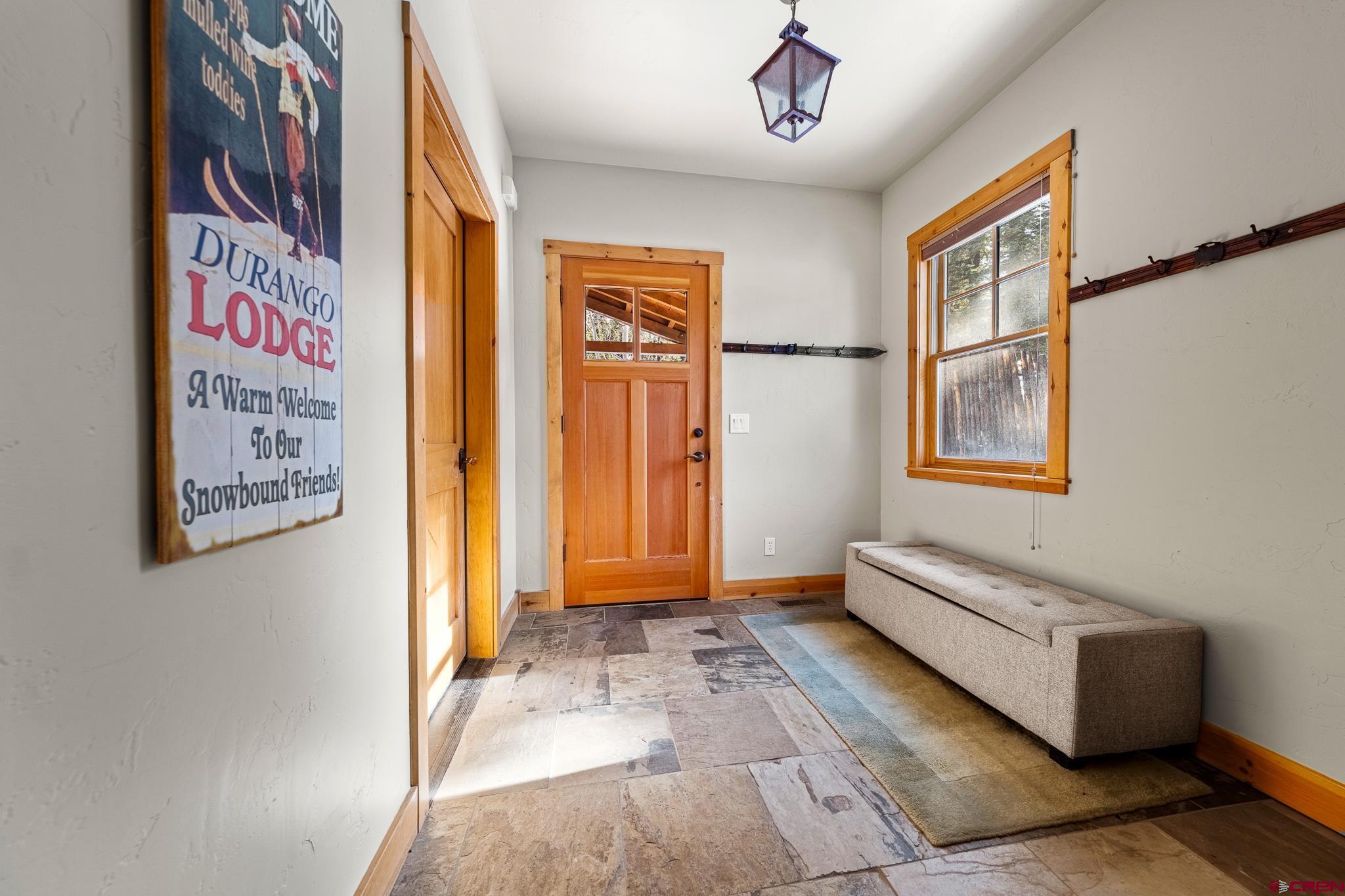 114 Limestone Court Durango, CO 81301 - Photo 3 of 35 a view of front door with wooden floor