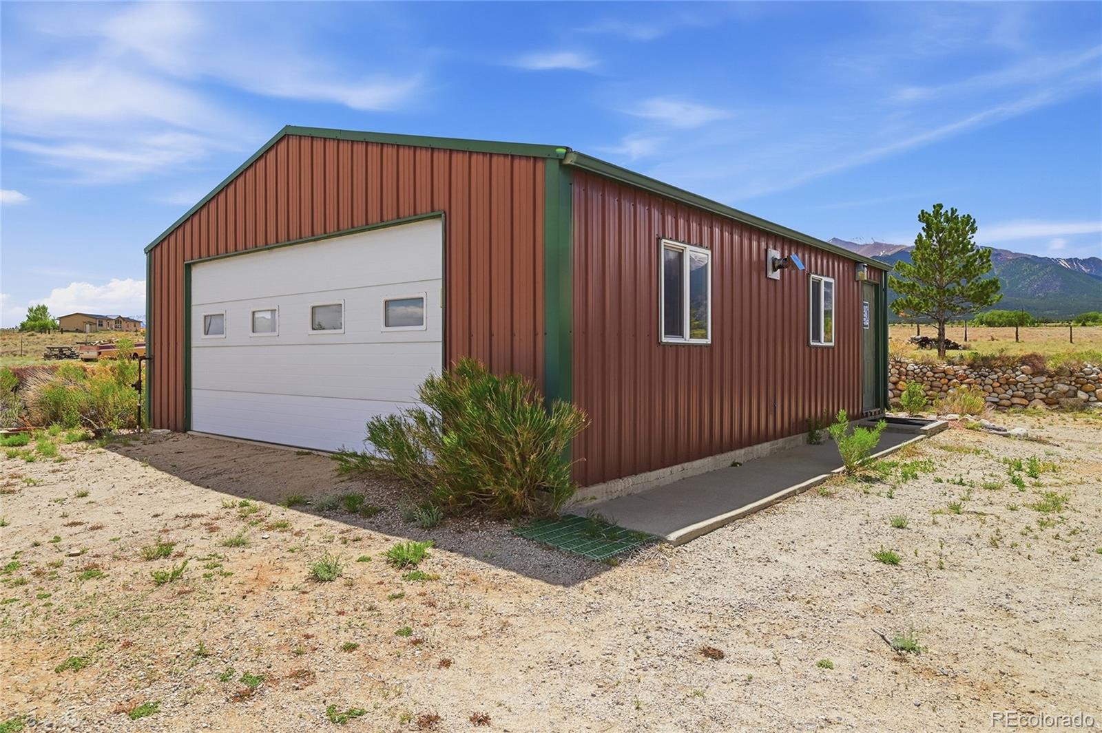 20300 Old Ranch Loop Nathrop, CO 81236 - Photo 29 of 35 a front view of a house with a yard