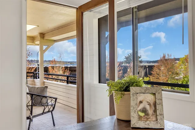 a view of a floor to ceiling window and dining room