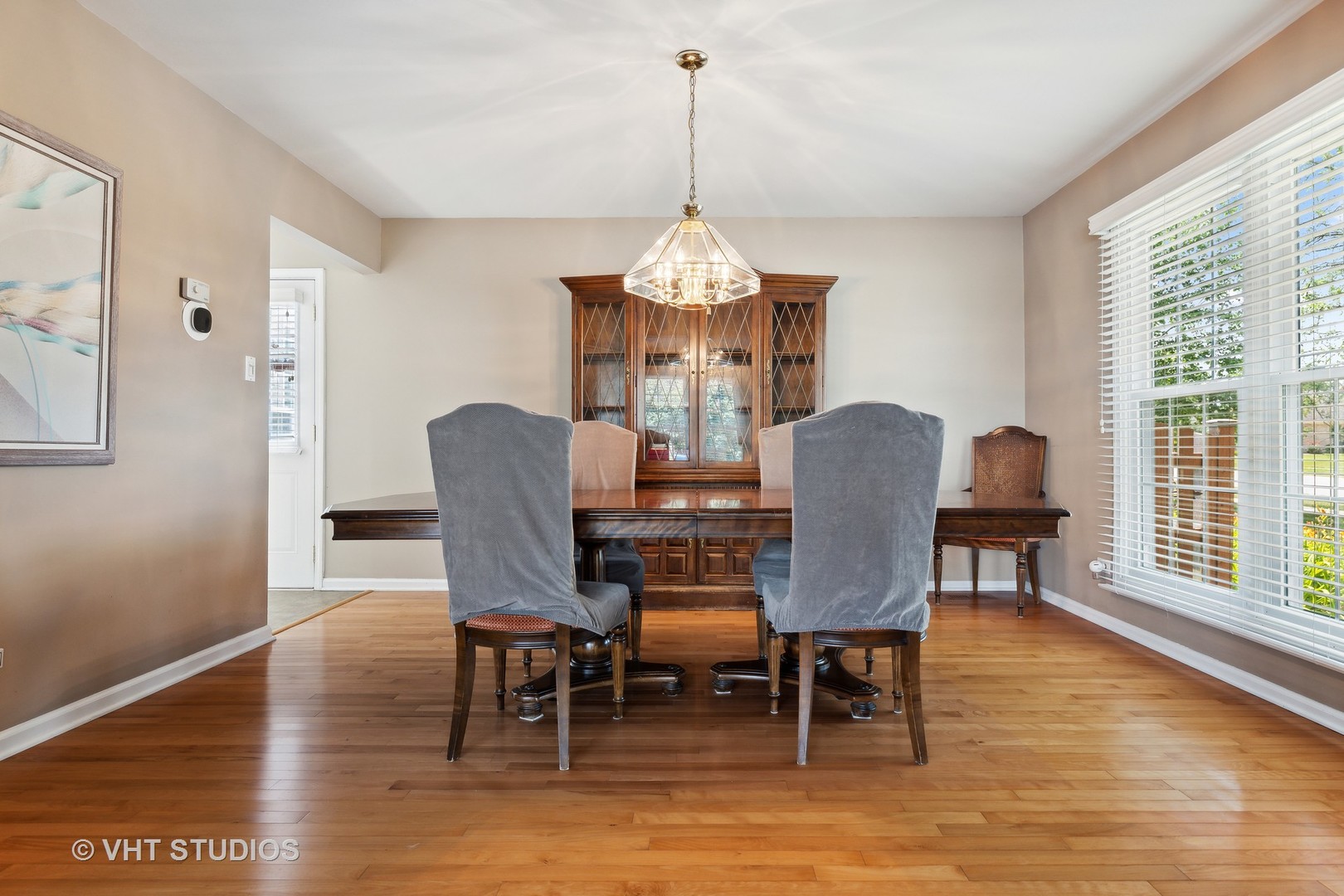 10001 Derby Lane Mokena, IL 60448 - Photo 12 of 31 a dining room with furniture window wooden floor