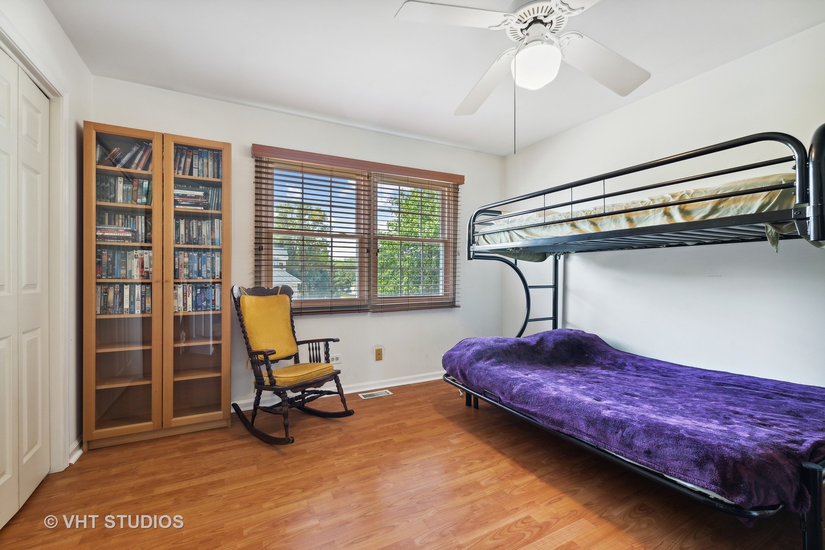 10001 Derby Lane Mokena, IL 60448 - Photo 18 of 31 a bedroom with a bed and a chandelier