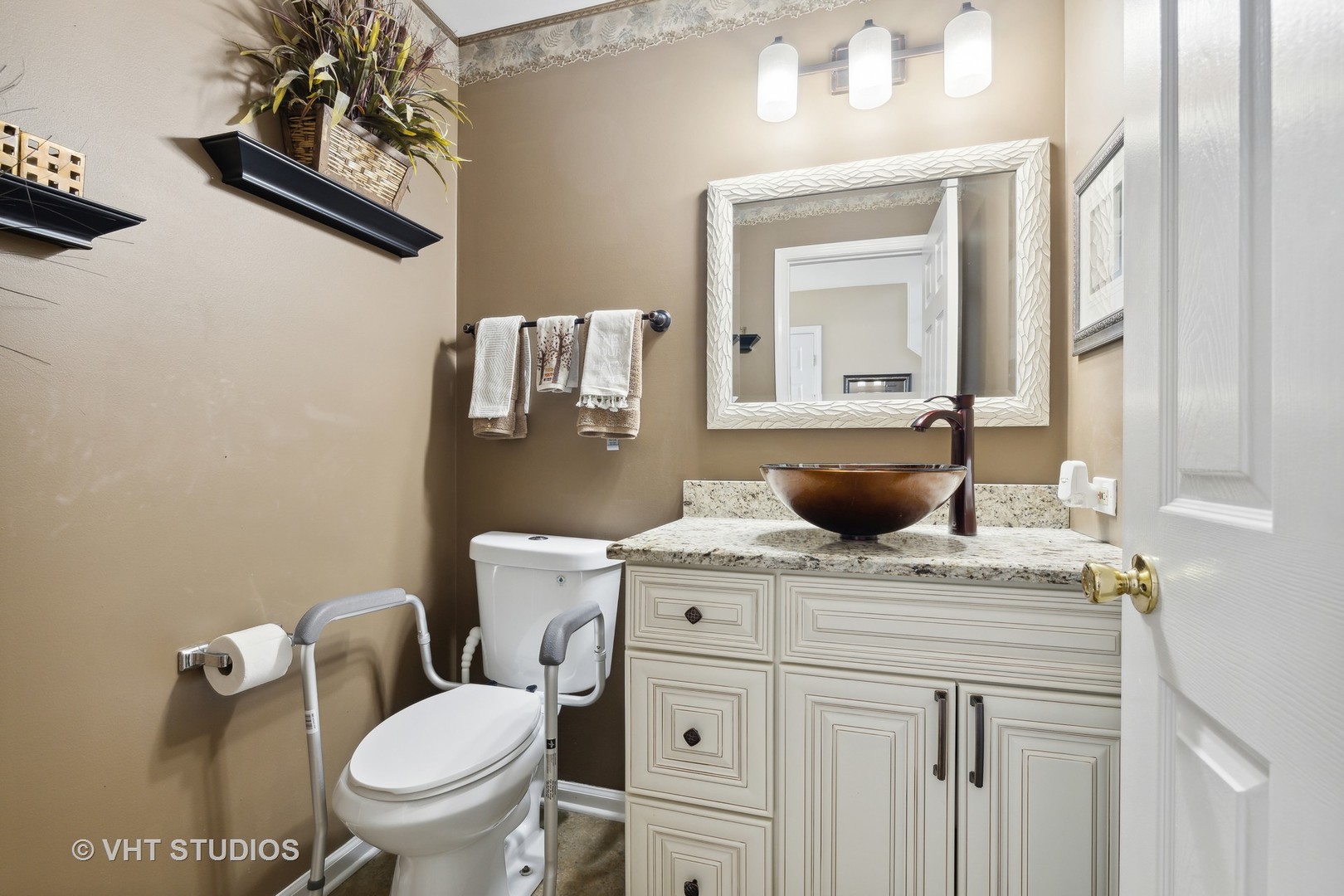 10001 Derby Lane Mokena, IL 60448 - Photo 20 of 31 a bathroom with a granite countertop toilet sink and mirror
