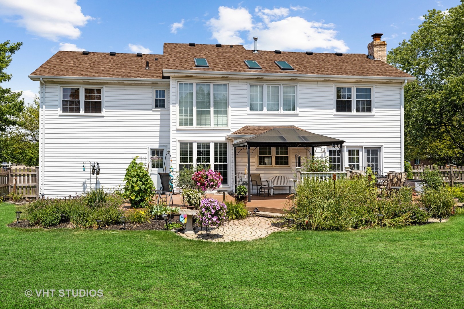 10001 Derby Lane Mokena, IL 60448 - Photo 25 of 31 a front view of a house with a yard and porch