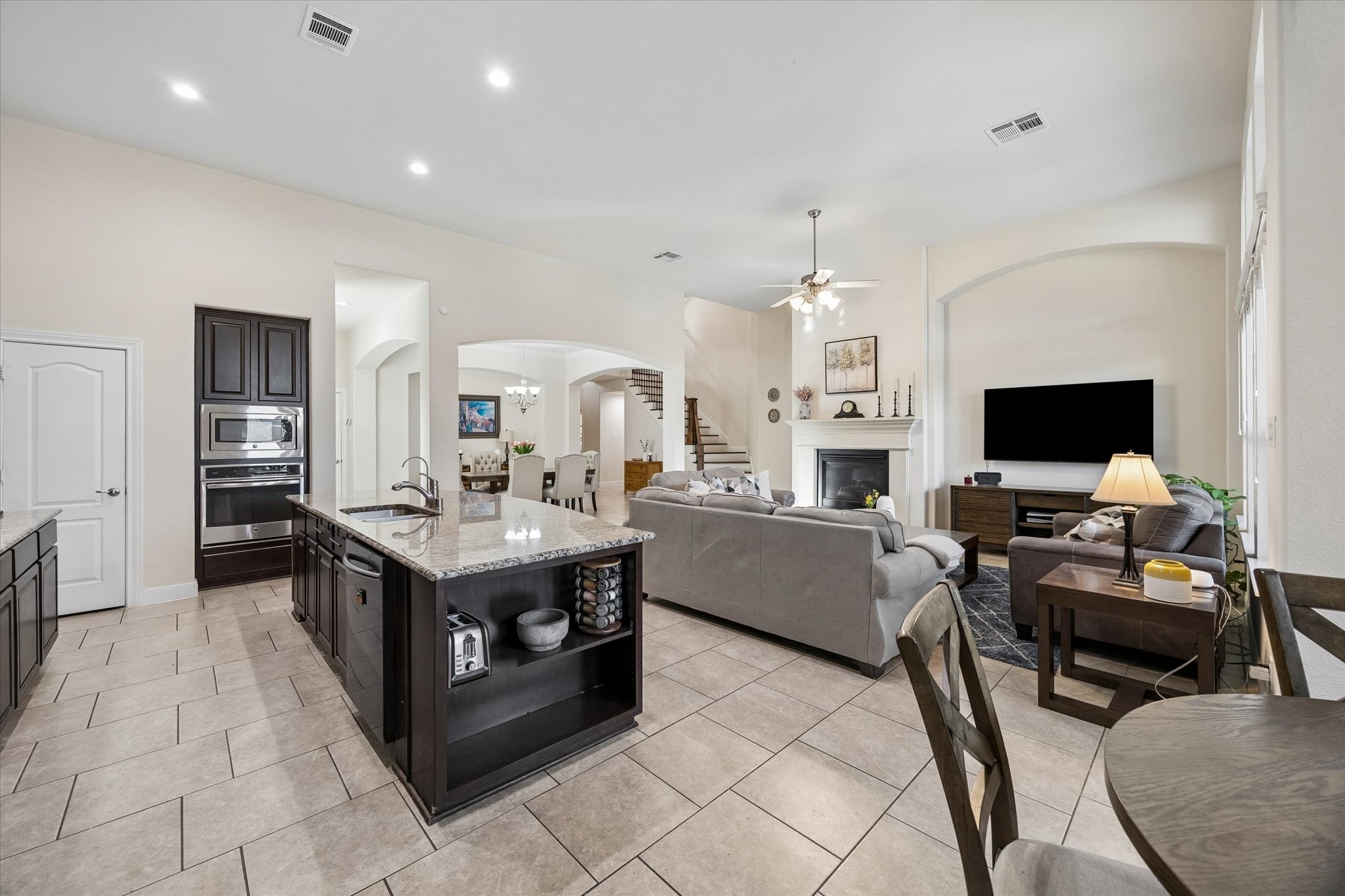 3306 Explorer Way Conroe, TX 77301 - Photo 15 of 35 Center island, with granite countertops and plenty of cabinet space.