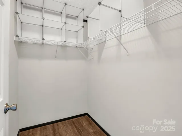 a view of a room with racks on the wall