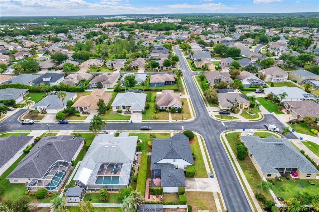 2021 Meadow Rue Court Trinity, FL 34655 - Photo 30 of 41 an aerial view of residential houses with outdoor space and street view
