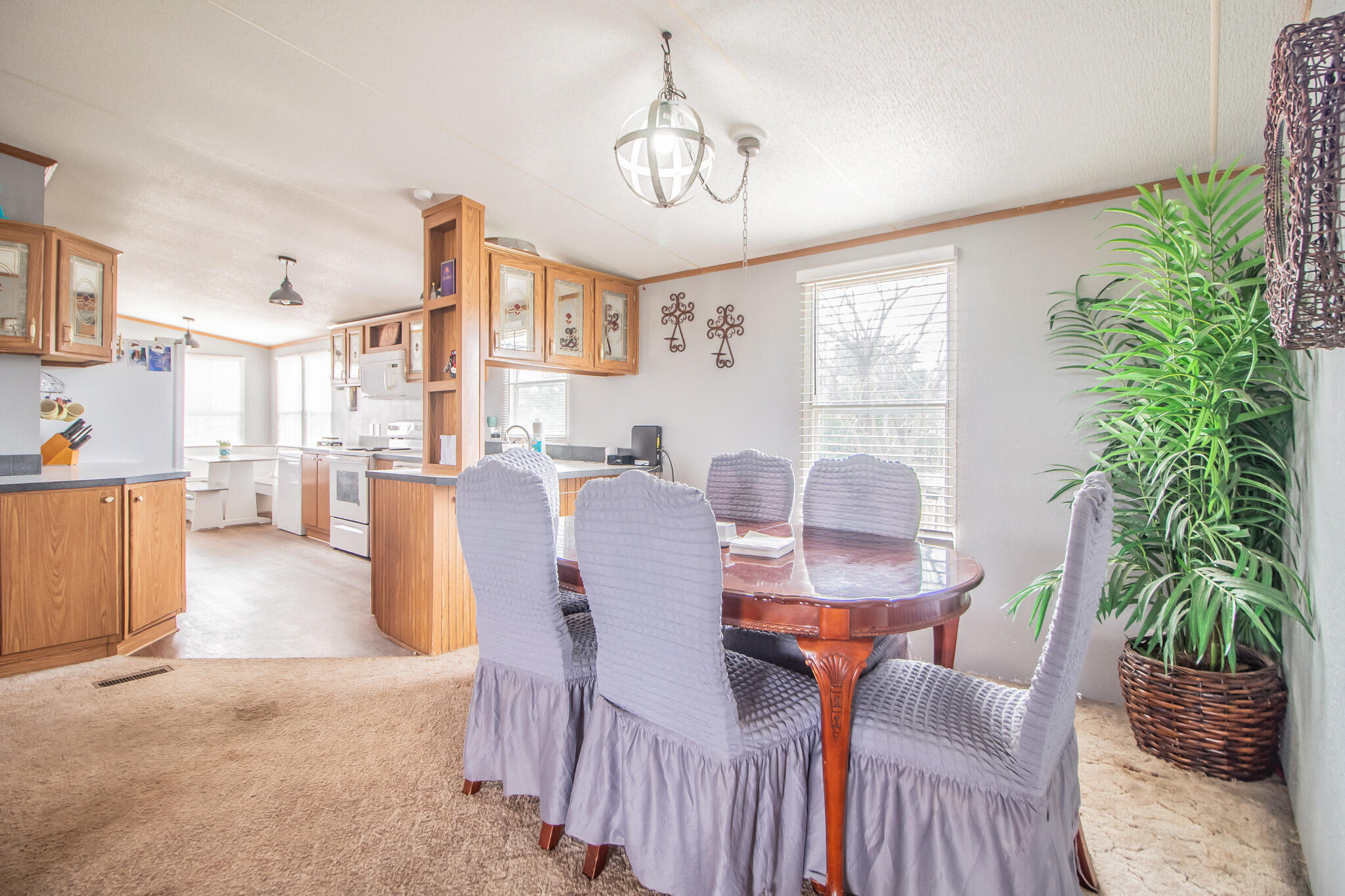 230 Bull Rider Road, Unit C Lubbock, TX 79404 - Photo 11 of 37 a view of a dining room with furniture window and outside view