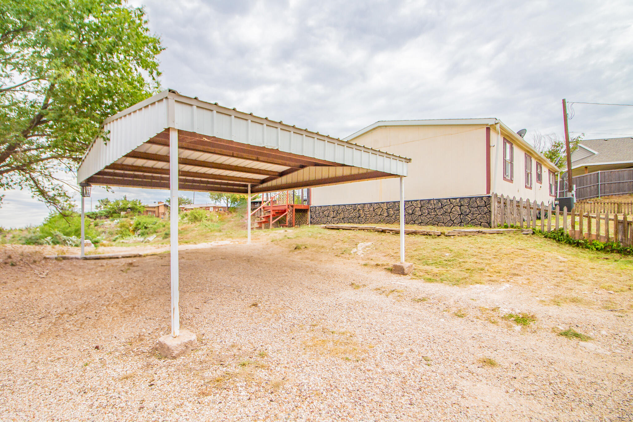 230 Bull Rider Road, Unit C Lubbock, TX 79404 - Photo 21 of 37 a view of a backyard