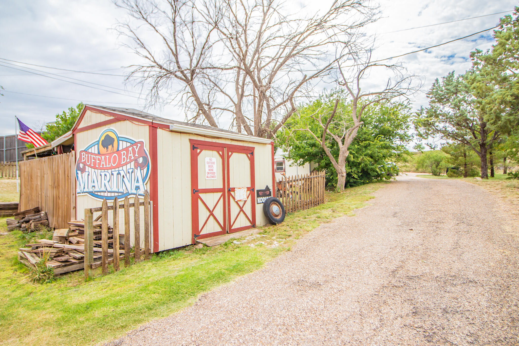 230 Bull Rider Road, Unit C Lubbock, TX 79404 - Photo 23 of 37 a view of a street with potted plants