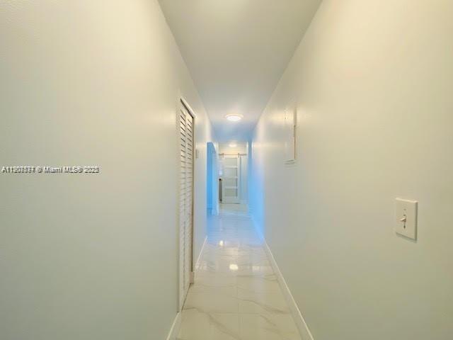3432 Northwest 4th Street, Unit 2 Miami, FL 33125 - Photo 4 of 13 a view of hallway