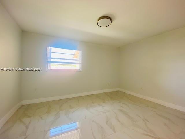 3432 Northwest 4th Street, Unit 2 Miami, FL 33125 - Photo 5 of 13 a view of a room that has a window