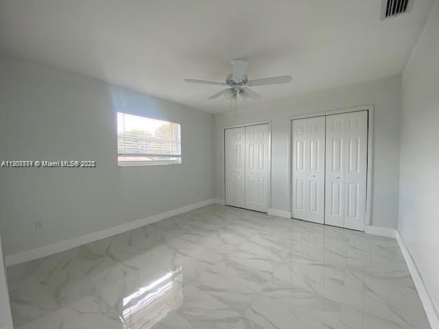 3432 Northwest 4th Street, Unit 2 Miami, FL 33125 - Photo 6 of 13 a view of an empty room with a window