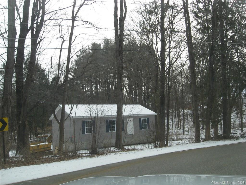 340 South Windham Road Windham, CT 06226 - Photo 1 of 1 a view of a building with a snow in front of it