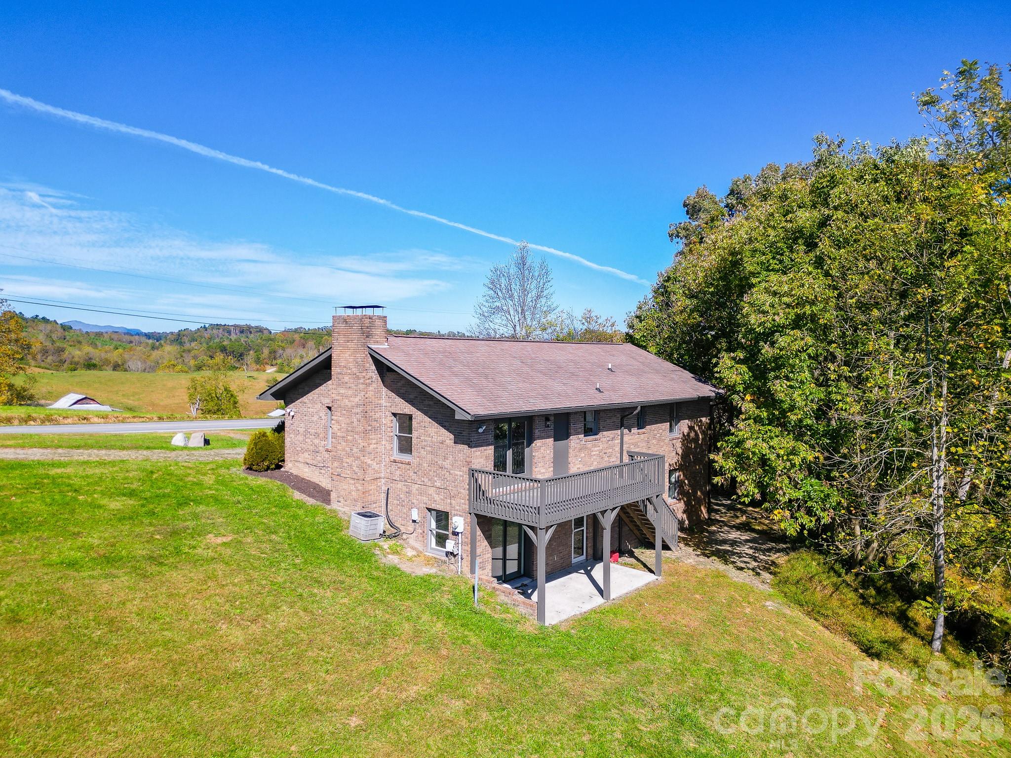 1248 Jenkins Valley Road Alexander, NC 28701 - Photo 2 of 43 a aerial view of a house with swimming pool garden and patio