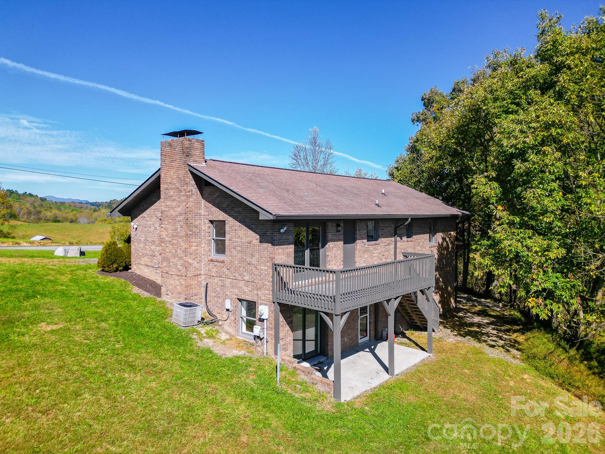 1248 Jenkins Valley Road Alexander, NC 28701 - Photo 36 of 43 a view of a house with a yard balcony and furniture