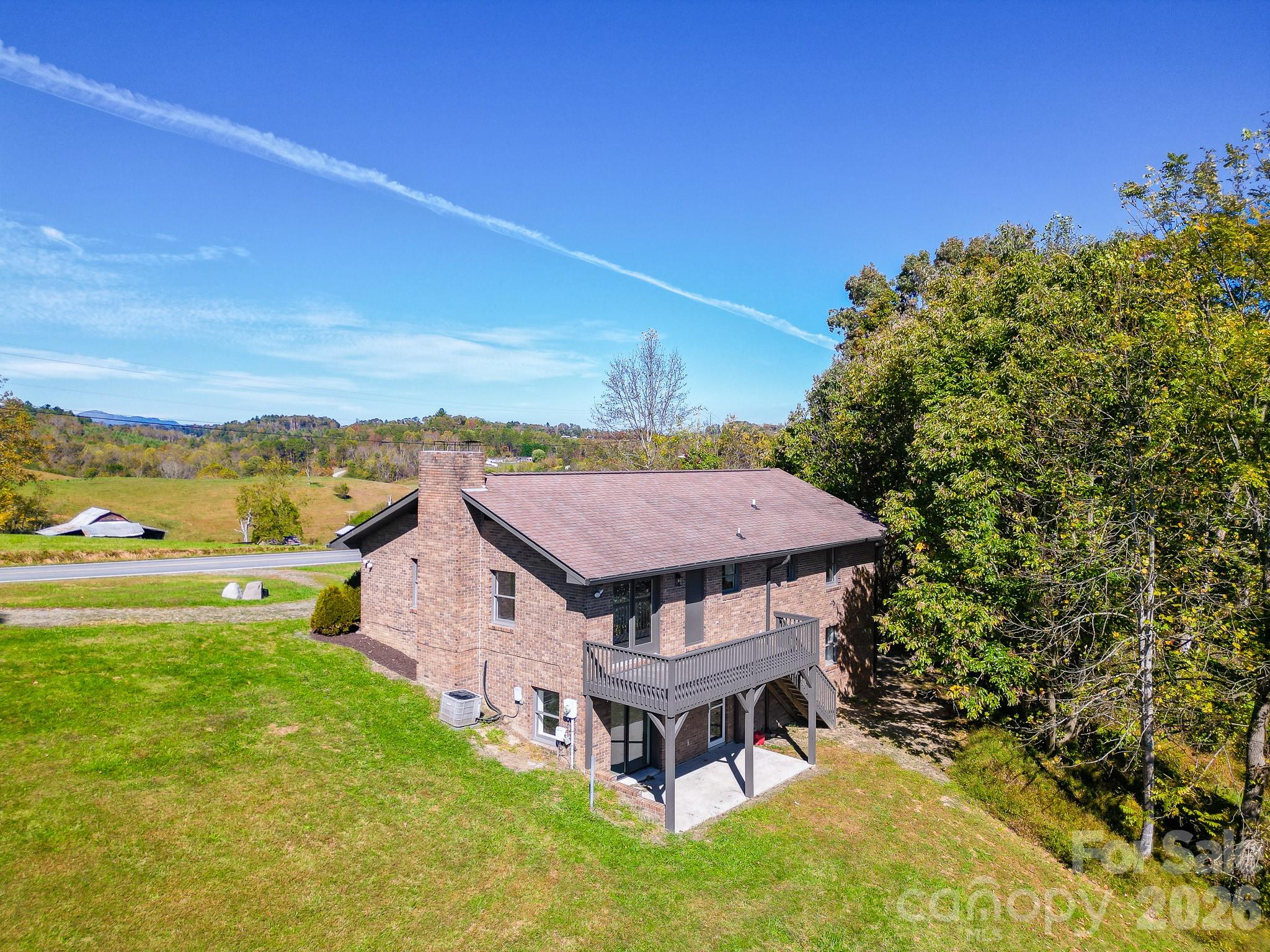 1248 Jenkins Valley Road Alexander, NC 28701 - Photo 39 of 43 a aerial view of a house with a big yard