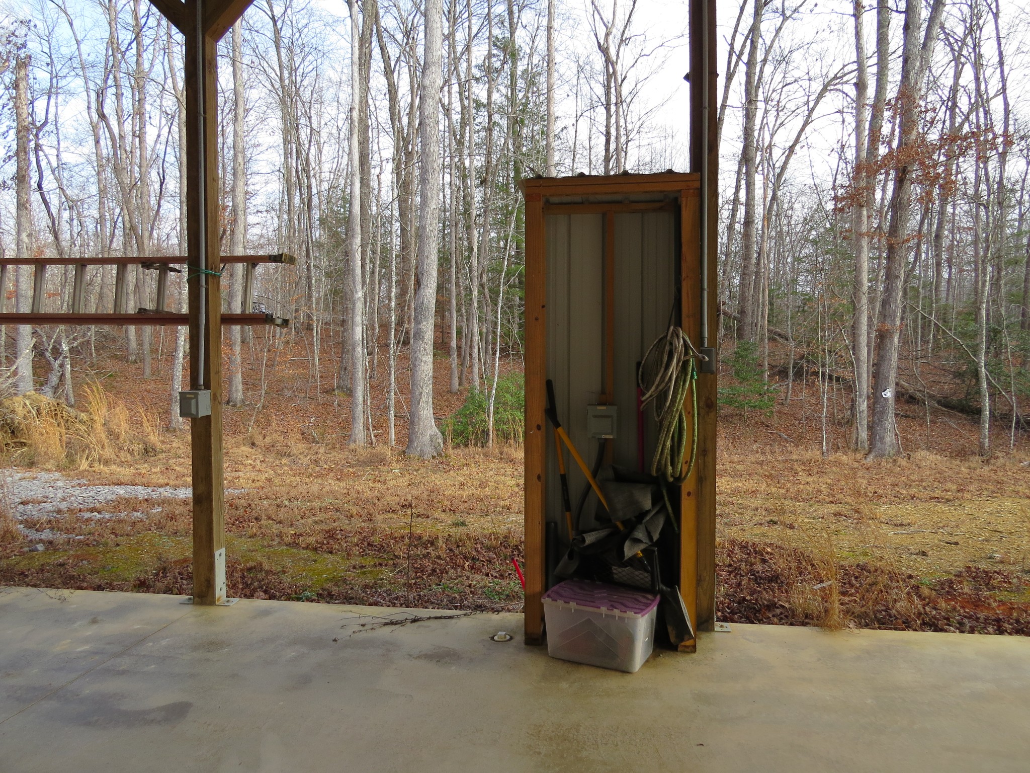 4345 Chapel Hill Road Crawford, TN 38554 - Photo 9 of 15 a backyard of a house with barbeque oven
