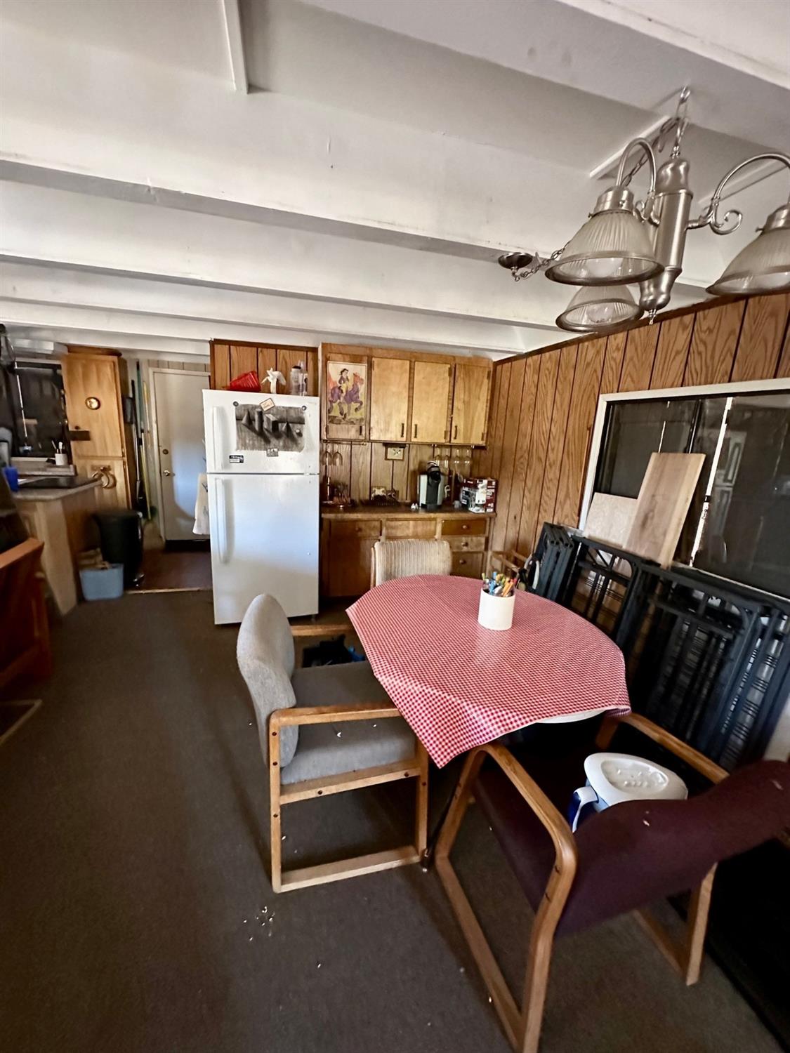 54758 Dinkey Creek Road Shaver Lake, CA 93664 - Photo 20 of 39 a patio with table and chairs