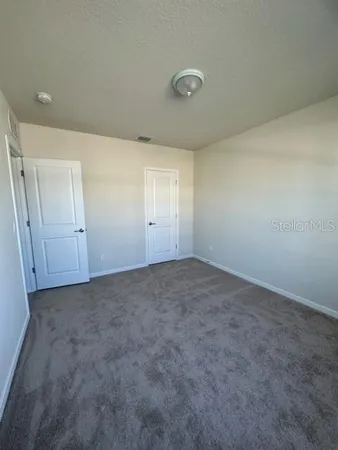 an empty room with an entryway