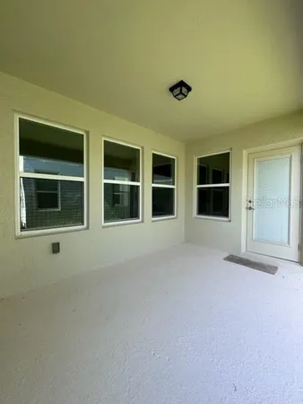 a view of water heater and a refrigerator
